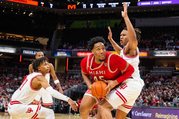 Nov 20, 2022; Indianapolis, Indiana, USA; Miami (Oh) Redhawks forward Anderson Mirambeaux (45) shoots the ball while Indiana Hoosiers forward Malik Reneau (5) defends in the first half at Gainbridge Fieldhouse. Mandatory Credit: Trevor Ruszkowski-USA TODAY Sports